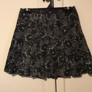 Agnis B. Skirt. Black and white flowers. Size 6